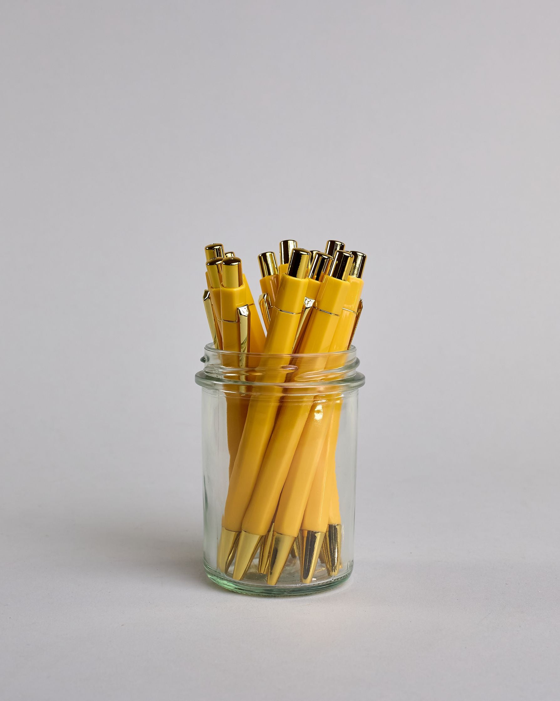 Gelber Kugelschreiber mit goldenem Clips und goldenem Druckknopf #1