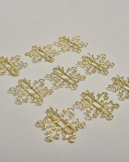 Büroklammern in Form von Schneeflocken aus goldenem Draht. Sie kommen in einer kleinen Silikonverpackung. #1