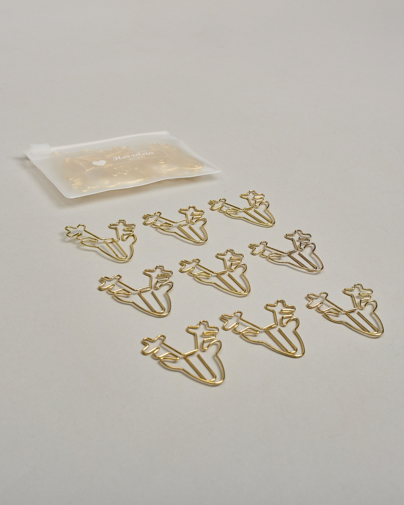 Büroklammern in Form von Rentieren aus goldenem Draht. Sie kommen in einer kleinen Silikonverpackung. #3