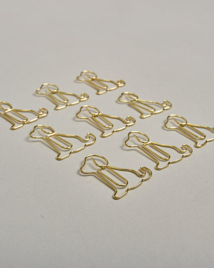 Zehn Büroklammern in Form von Hunden aus goldenem Draht. Sie kommen in einer kleinen Silikonverpackung. #1
