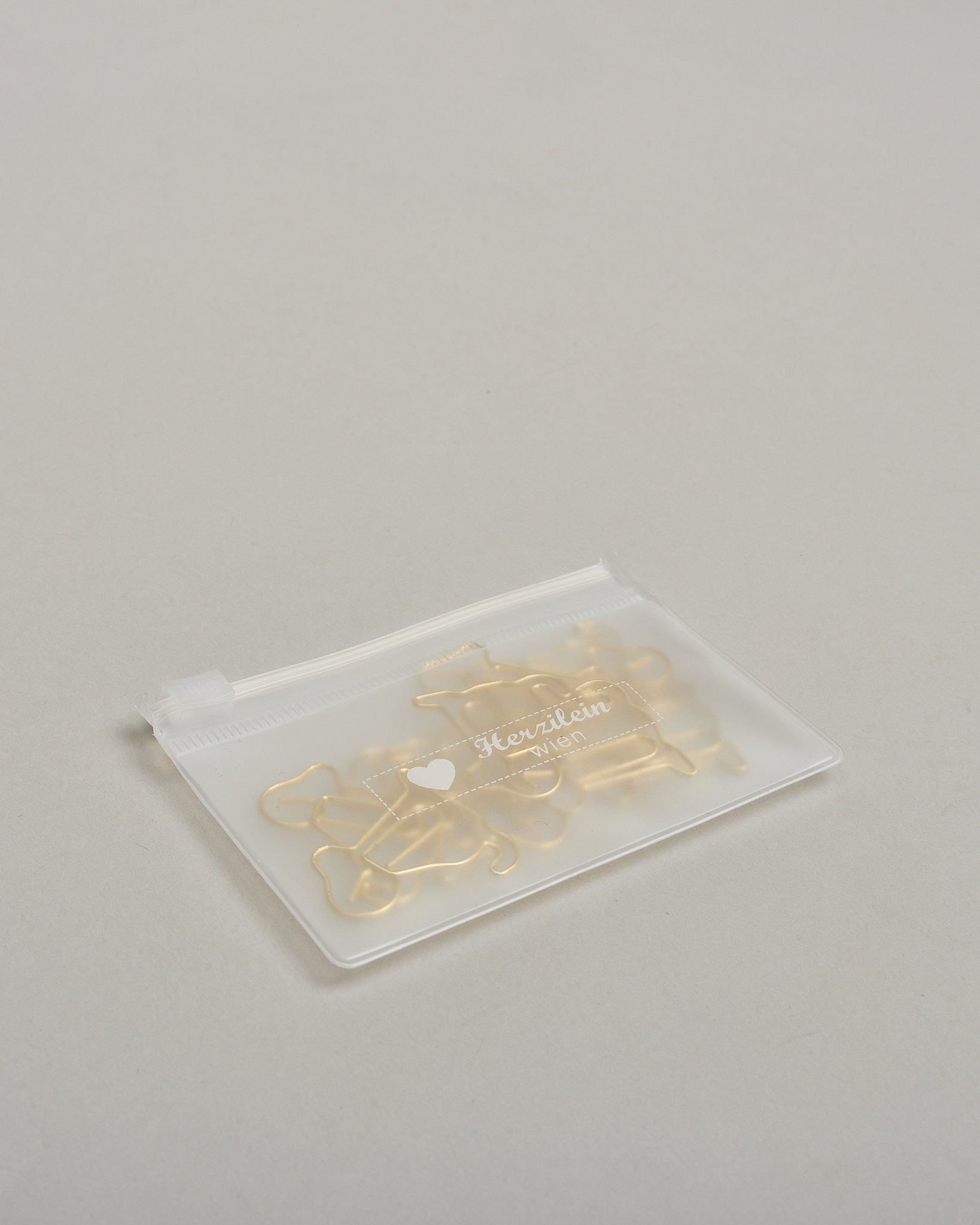 Zehn Büroklammern in Form von Hunden aus goldenem Draht. Sie kommen in einer kleinen Silikonverpackung. #4