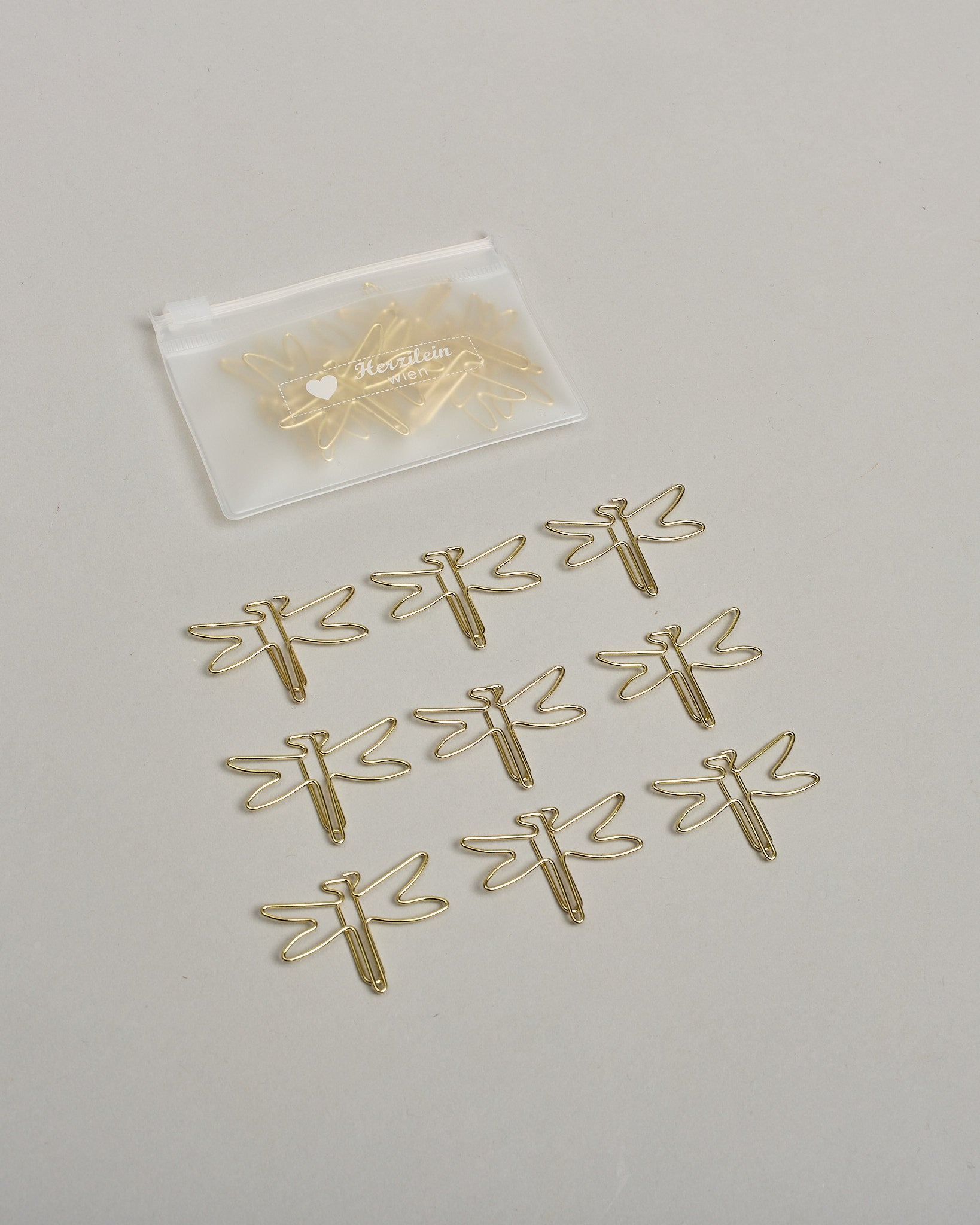 Büroklammern in Form von Libellen aus goldenem Draht. Sie kommen in einer kleinen Silikonverpackung. #2