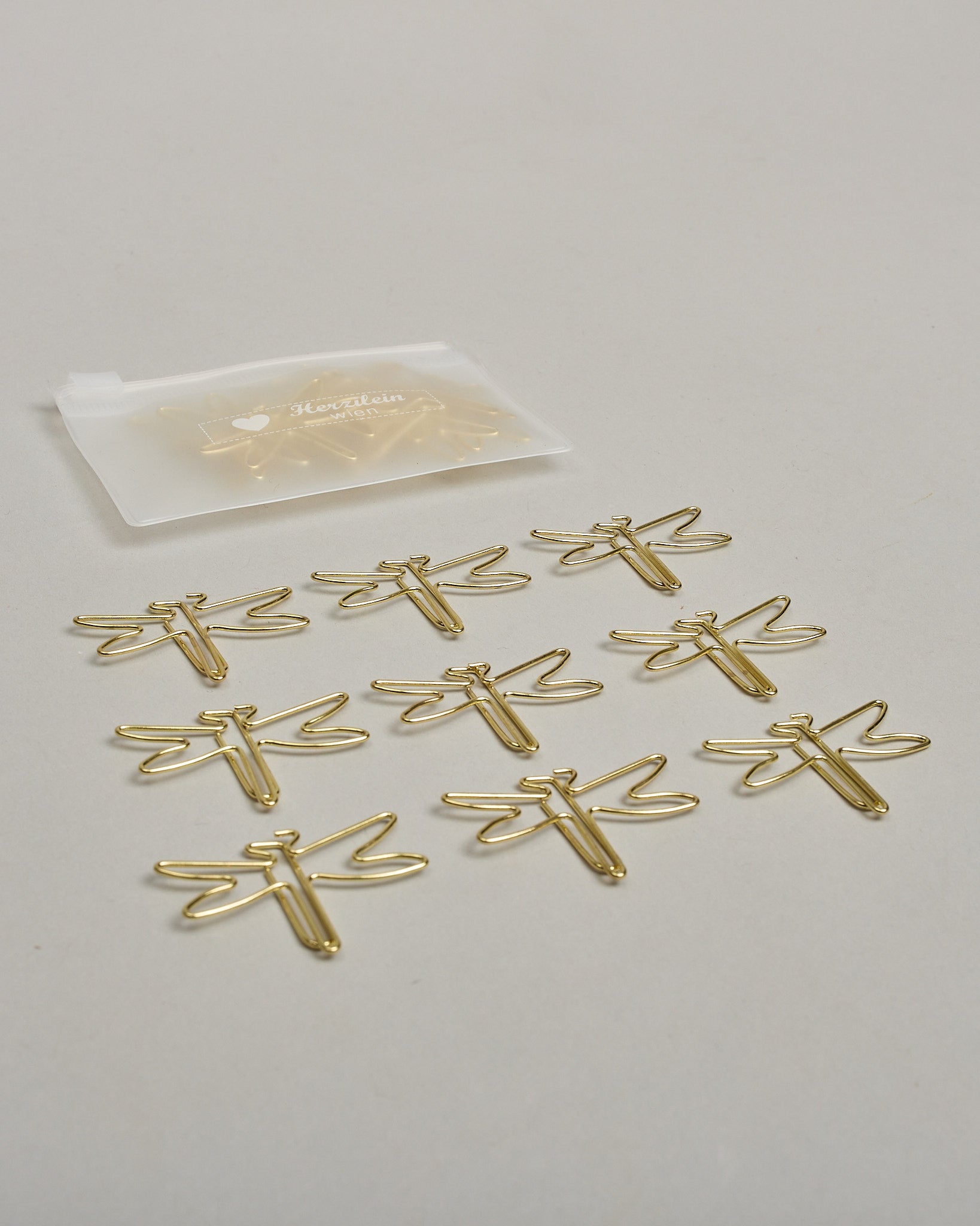 Büroklammern in Form von Libellen aus goldenem Draht. Sie kommen in einer kleinen Silikonverpackung. #3