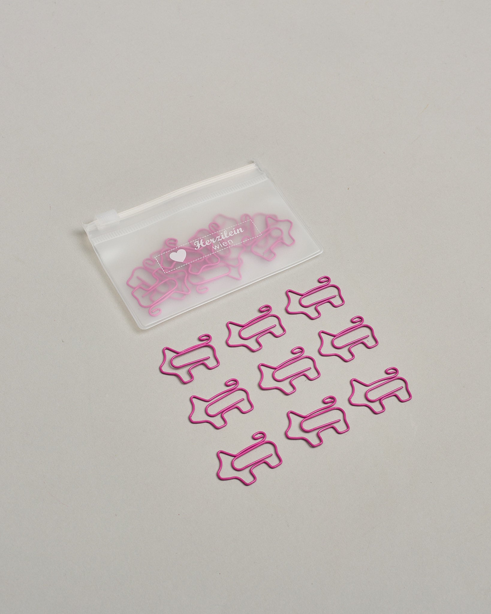 Büroklammern in Form von Schweinen in pinkem Draht. Sie kommen in einer kleinen Silikonverpackung. #2