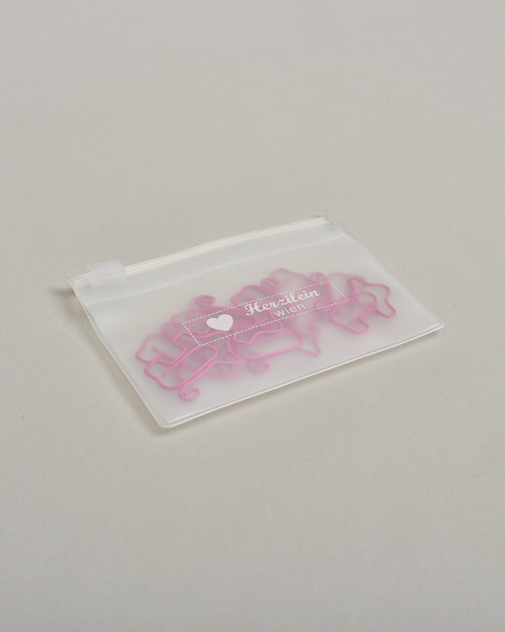 Büroklammern in Form von Schweinen in pinkem Draht. Sie kommen in einer kleinen Silikonverpackung. #4